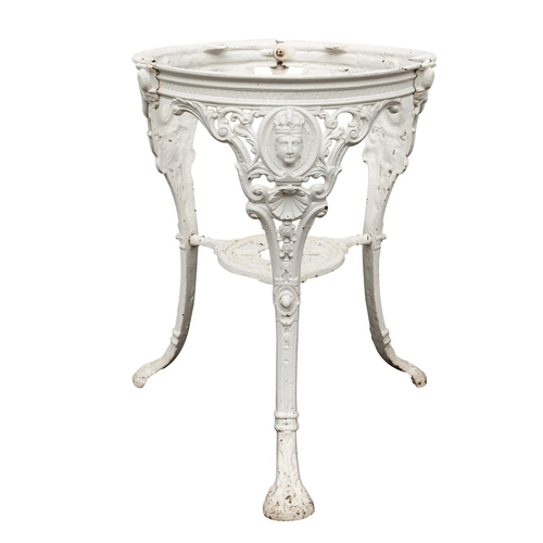 1203 - An Edwardian painted cast iron garden table base, early 20th century; the three monopodial legs desc... 