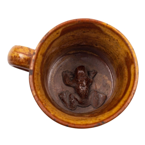 121 - A 19th century slipware pottery frog mug, attributed to Buckley of waisted form, inscribed 'Sarah Ed... 