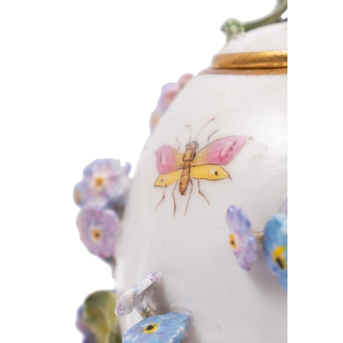 224 - A pair of Meissen miniature bottle vases and covers; a Meissen tripod vase and cover; and a Berlin p... 