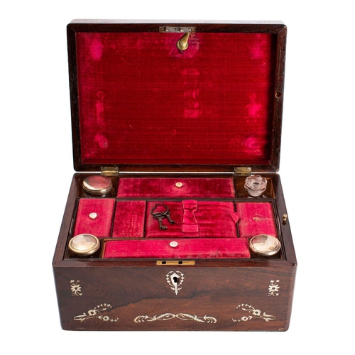 257 - A Victorian rosewood and shell marquetry dressing case, circa 1875; the hinged cover opening to a fi... 