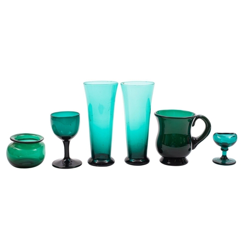 3 - A mixed group of 'Bristol' green glass, primarily goblets and beakers, but including a tankard, undi... 