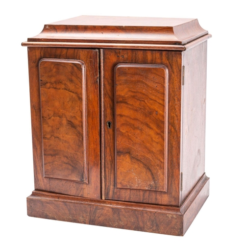 324 - A Victorian walnut table top cigar cabinet, late 19th century; the top with cavetto moulded edges, a... 