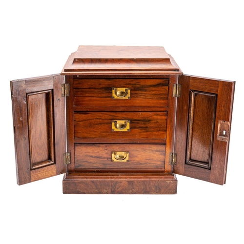 324 - A Victorian walnut table top cigar cabinet, late 19th century; the top with cavetto moulded edges, a... 