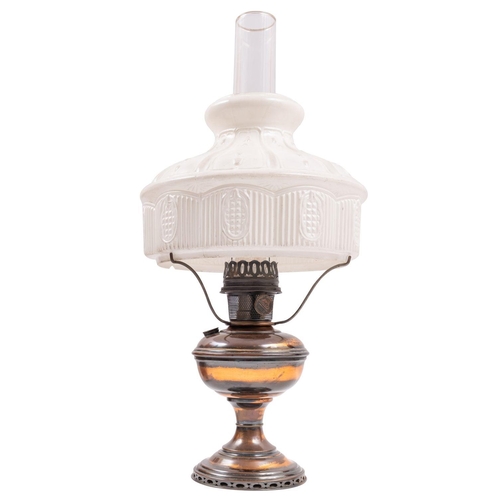 337 - A copper and glass table oil lamp, 20th century, by the Aladdin Mantle Lamp Co.; with pressed milk g... 