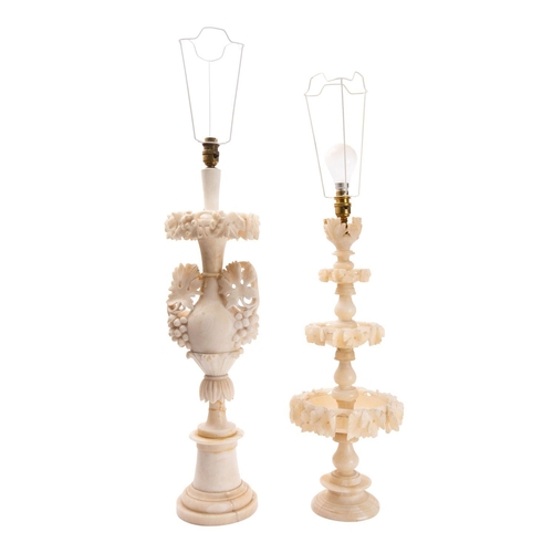 361 - Two North Italian carved alabaster table lamps, first half 20th century; one modelled as a twin hand... 