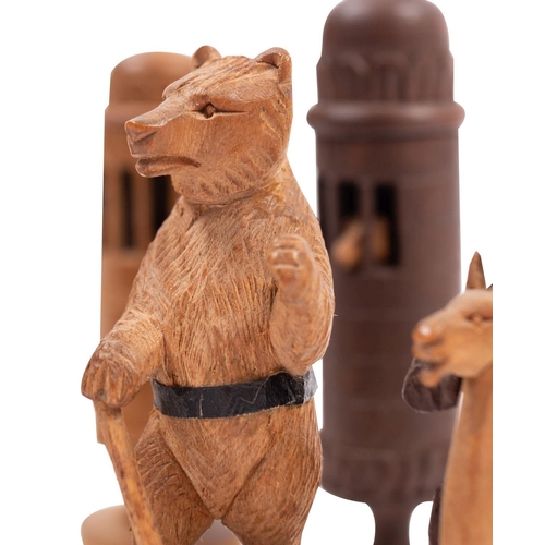 366 - A Swiss carved and stained softwood Bears of Berne chess set, first half 20th century; the anthropom... 