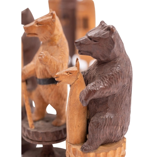 366 - A Swiss carved and stained softwood Bears of Berne chess set, first half 20th century; the anthropom... 