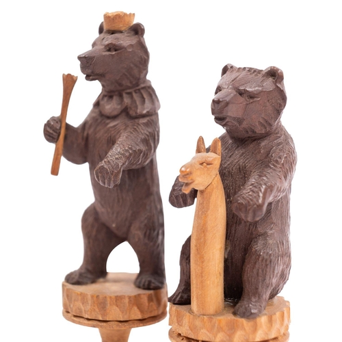 366 - A Swiss carved and stained softwood Bears of Berne chess set, first half 20th century; the anthropom... 