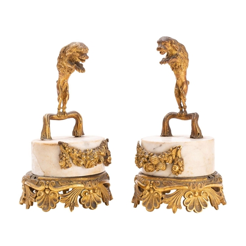 368 - A pair of Regency ormolu and marble mounted ornaments or stands modelled with hounds, early 19th cen... 