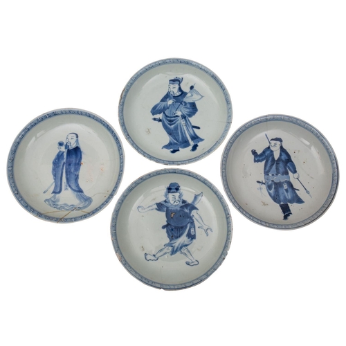 73 - A set of four Chinese blue and white 'Immortals' saucer dishes each depiction painted within a key p... 