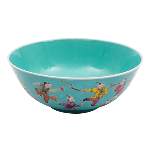 84 - A Chinese porcelain turquoise ground 'Boys' bowl, the exterior decorated in famille colours with boy... 