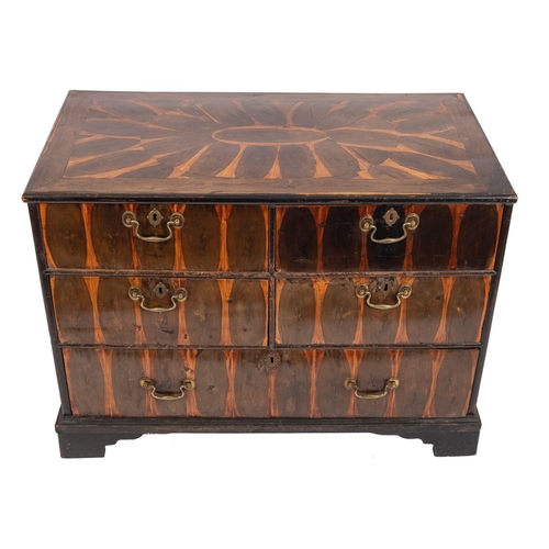 861 - A George II oyster laburnum chest of drawers; the inlaid top above four short and one long drawer, w... 