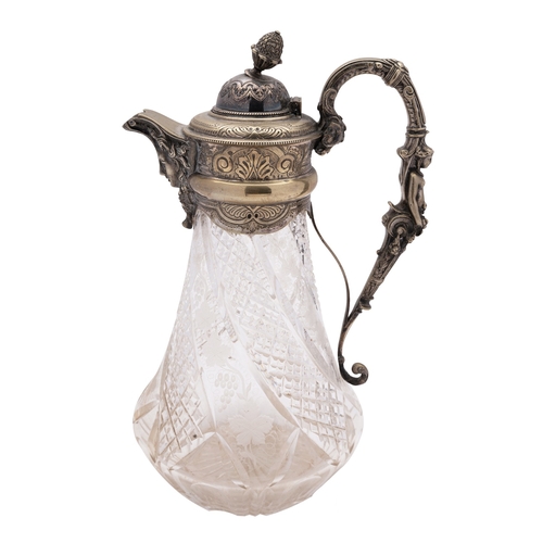 14 - A late 19th century silver plate and glass claret jug, unmarked, of inverted tapering form, engraved... 