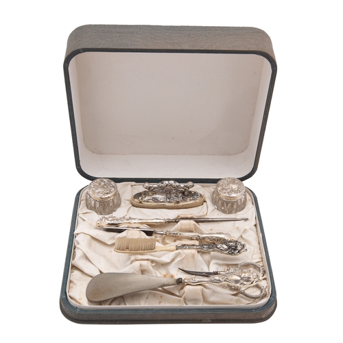 216 - An early 20th century American Art Nouveau silver lady's dressing table set, stamped Sterling, silve... 