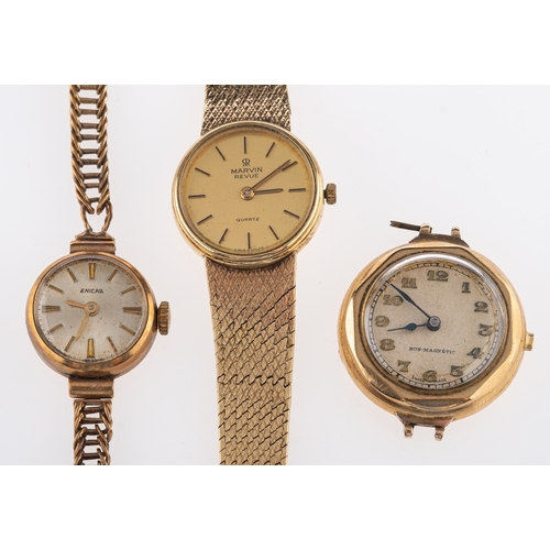 380 - Marvin a gold quartz wristwatch, the dial with raised baton numerals and signed Marvin Revue, with b... 