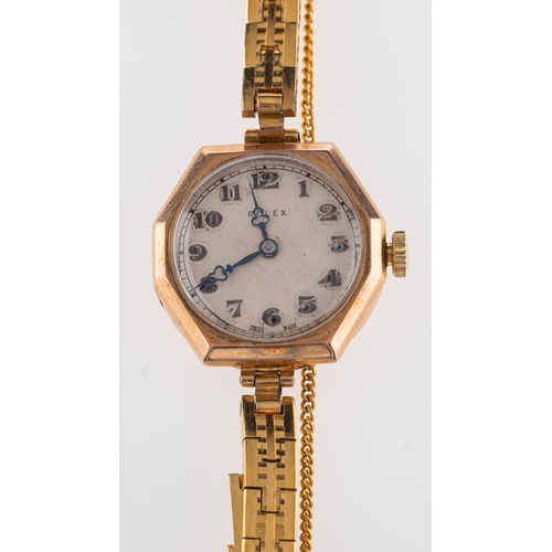 412 - Rolex, a lady's 9ct gold wristwatch the round dial with raised Arabic numerals and signed Rolex, the... 