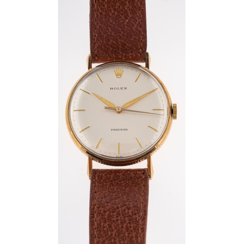 416 - Rolex a gentleman's gold wristwatch model 3012 the cream dial with raised baton numerals, baguette h... 