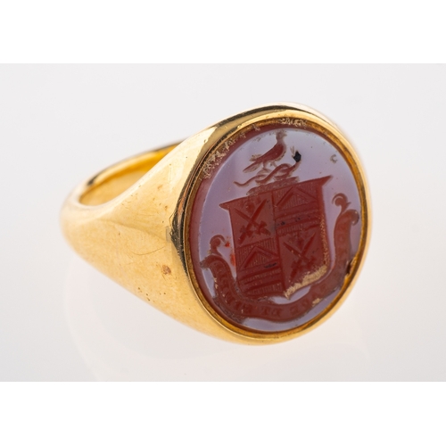 687 - A George IV 18ct gold and black enamel memorial ring, circa 1828, the black enamel band with a chase... 