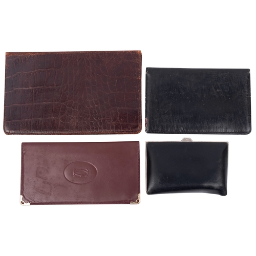 747 - Cartier ,Paris. A brown leather wallet, together with  two other unsigned wallets and a black leathe... 