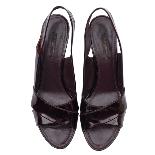 779 - Louis Vuitton. A pair of   dark brown patent leather Amarante Wedge Sandals, size 41, wooden heel wi... 