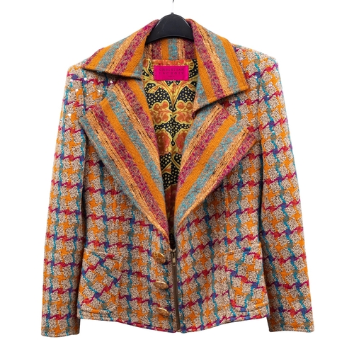 781 - Christian Lacroix. A vintage wool two piece suit, the orange mauve and cyan coloured dogtooth patter... 