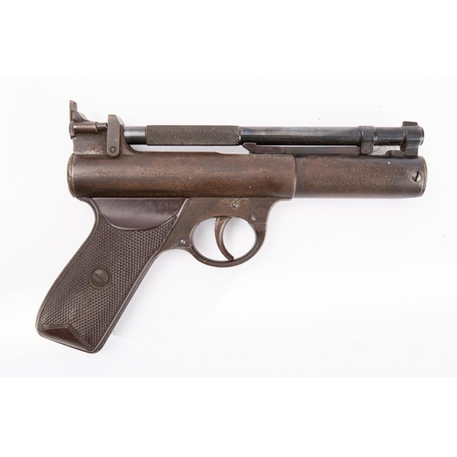 57 - A Webley 'Senior' .22 calibre air pistol, serial number S13205, with two-piece brown chequered grip.