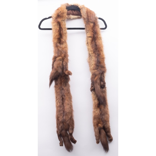 618 - A collection of various fur stoles, together with a small muff, a fur coat  (worn) and a small group... 