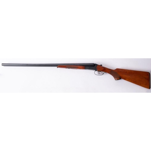 63 - A Baikal 12 bore side by side boxlock shotgun, serial number '23186', double trigger, chequered semi... 