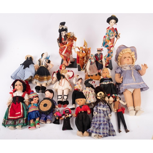 643 - A collection of seventeen various costume dolls including China, Japan, Holland, Spain, Italy, a lar... 