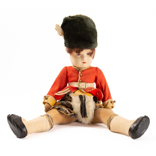 652 - Lenci, Chad Valley or similar. An early 20th century linen head Highland Guardsman doll,  brown hair... 