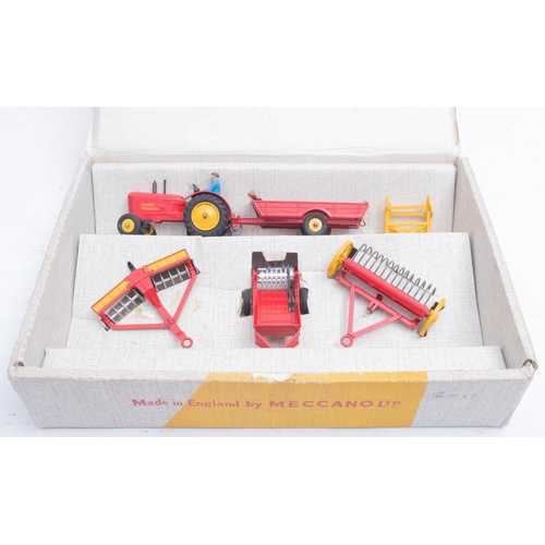 667 - Dinky 398 'Farm Equipment' Gift Set. comprising Massey Ferguson Tractor red with yellow hubs, driver... 