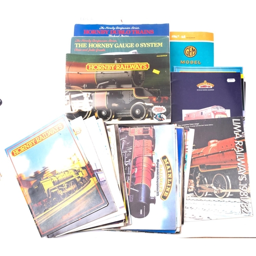 696 - A collection of Horny OO/HO gauge catalogues, together with Foster .M, 'Hornby Dublo 1938-1964 and C... 