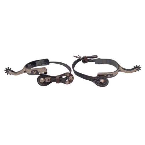 895 - A pair of late 20th Century, blued steel, leather and decorated with white metal spurs, not marked, ... 