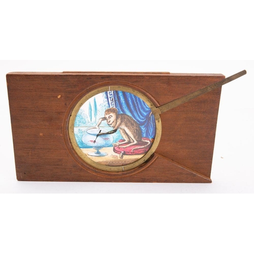 899 - A 19th Century magic lantern  lever slide of a monkey  with a fork over a fish bowl, unsigned, 10 x ... 