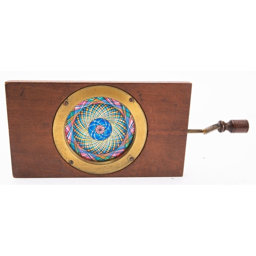 901 - A 19th century Chromotrope, unsigned, with blue, yellow, pink and black kaleidoscope effect. , 10 x ... 