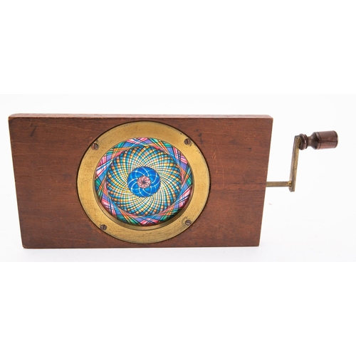 901 - A 19th century Chromotrope, unsigned, with blue, yellow, pink and black kaleidoscope effect. , 10 x ... 