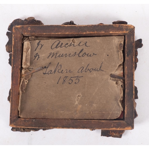 904 - A 19th century ambrotype of Army cobblers, the image showing two mean seated with tools an shoes bes... 