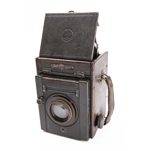 908 - A Thompson Pickard 'Junior Special' camera, with glass slides, in its original case, circa 1926.