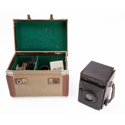 908 - A Thompson Pickard 'Junior Special' camera, with glass slides, in its original case, circa 1926.