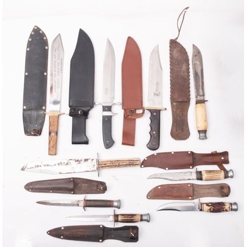 92 - A  group of nine various Bowie style knives, various makers and a WWII fighting knife, maker William... 