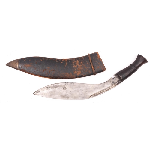 94 - A late 19th/early 20th century Kukri with later markings, the blade stamped with broad arrow and num... 