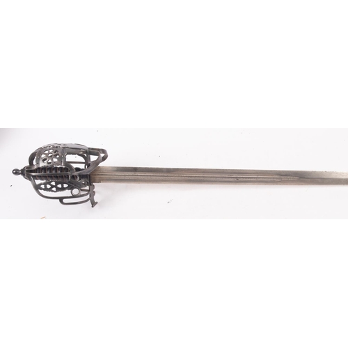 115 - A Reproduction Scottish basket hilted broad sword, possibly a stage sword, 100cm long.