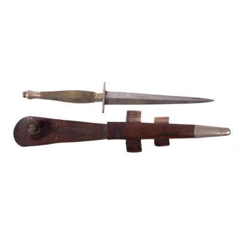 125 - A WWII Fairbairn Sykes Fighting Knife, Second pattern, the straight double edge blade over an oval h... 