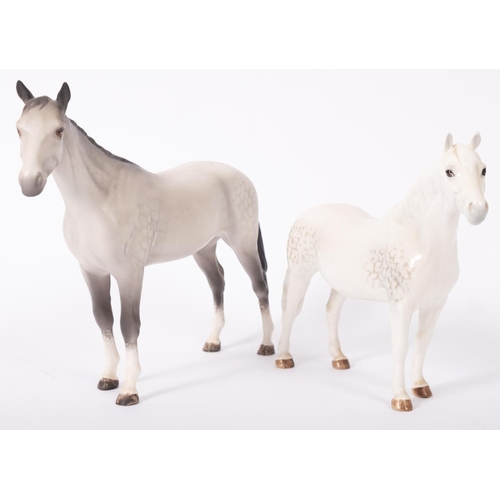 13 - Two dapple grey Beswick horses, in matte and gloss finish, the largest 20cm high overall.