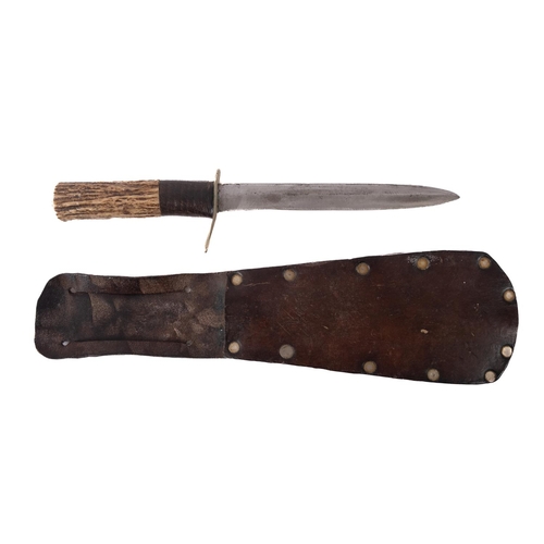 131 - A WWII period Finish Hunting/Fighting Knife, the straight single edge blade over a brass hilt and an... 