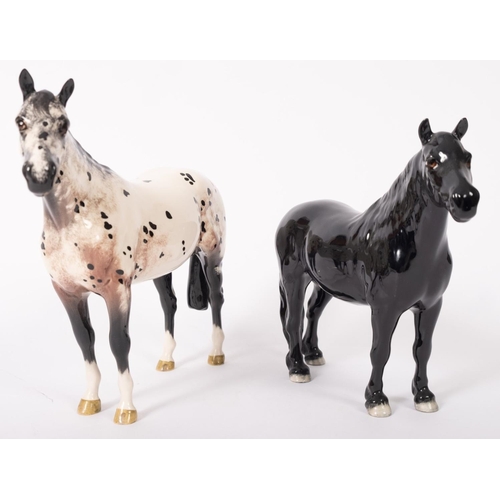 14 - A Royal Doulton Appaloosa horse and Beswick black horse, both in gloss finish, the largest 20cm high... 