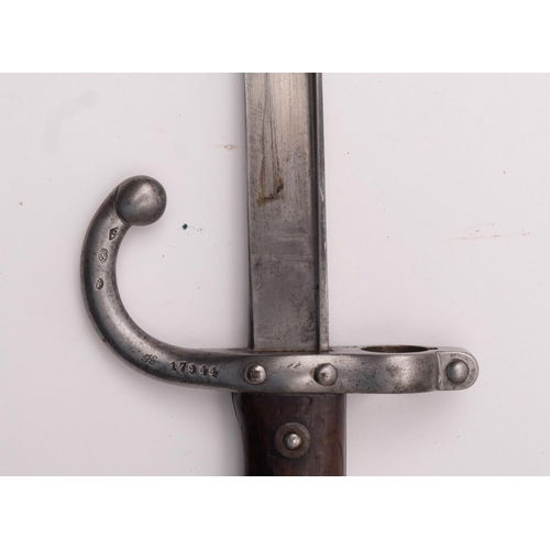 150 - A French 1874 pattern Gras sword bayonet, the single edge 'T' section blade over a steel hook quillo... 