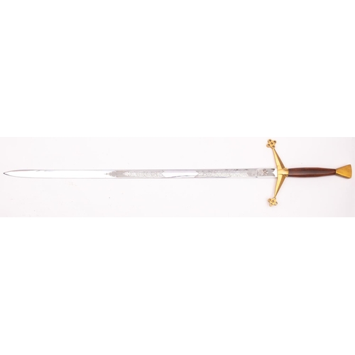 163 - A Wilkinson Presentation Sword, with acid etched blade, signed as per title with gilt brass hilt and... 