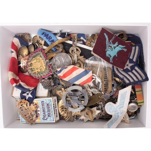 169 - A Collection of various British and Foreign military buttons, badges and cloth patches.