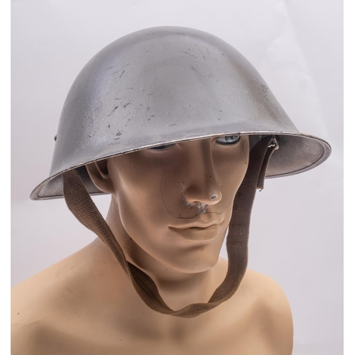 176 - An Italian army steel helmet, with black leather liner, together with a MK.III 'Turtle' steel helmet... 